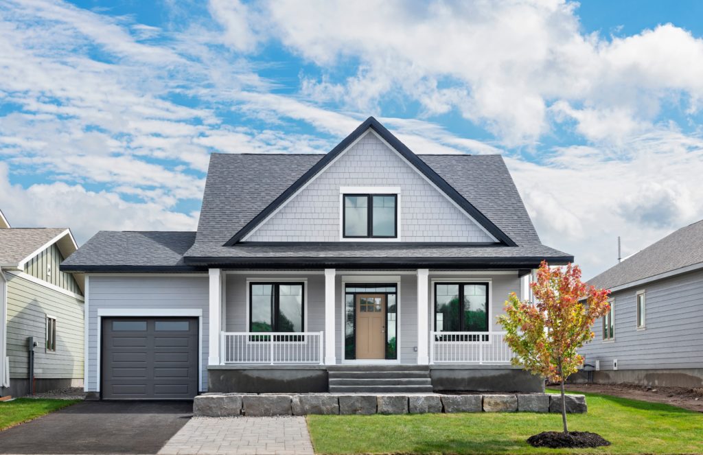Exterior of model home at “Watercolour Westport” Net Zero Ready community by Land Ark Homes – Westport, ON