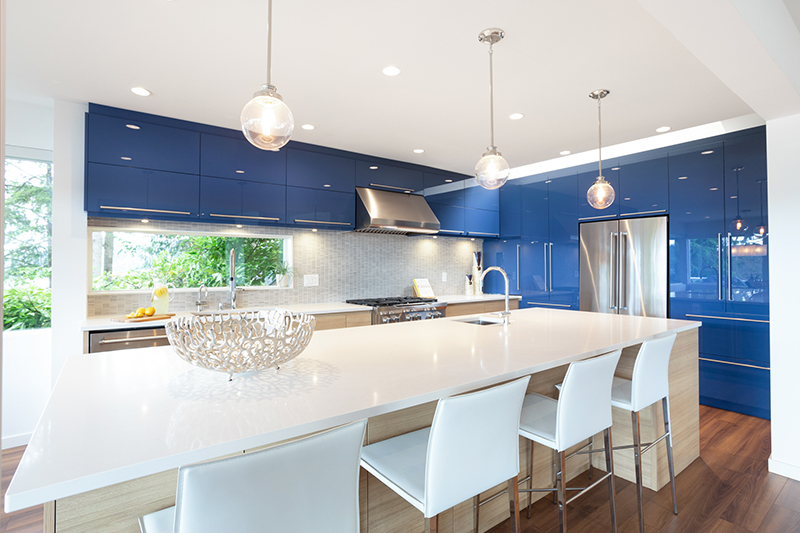 Open Concept Kitchen with blue cabinets