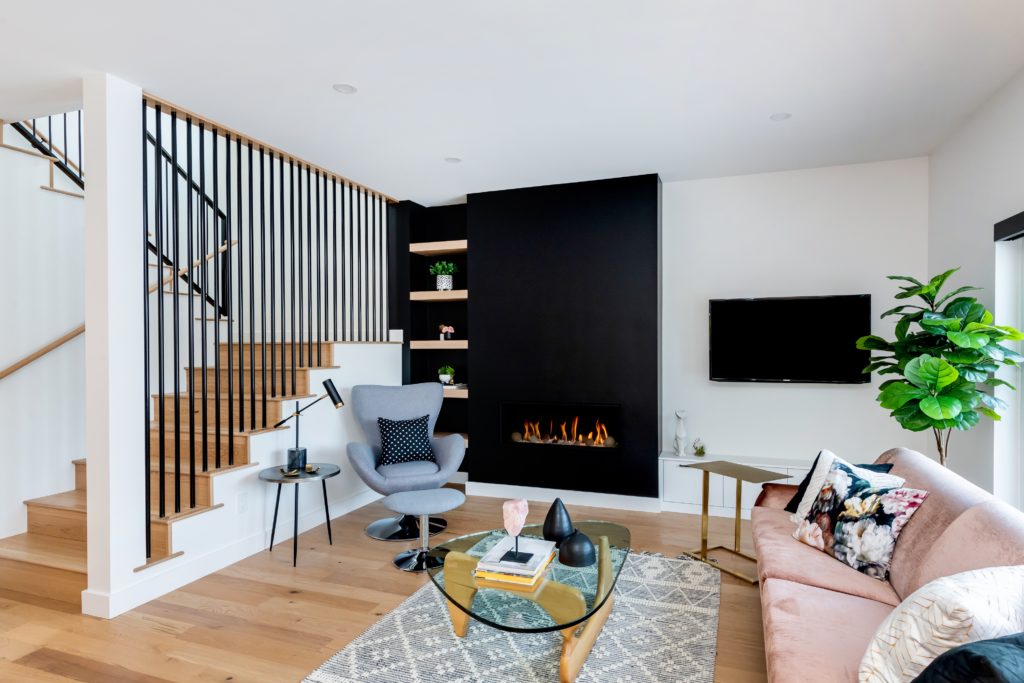 Mid-century modern style living space by Bella Vista Developments – Saskatoon, SK