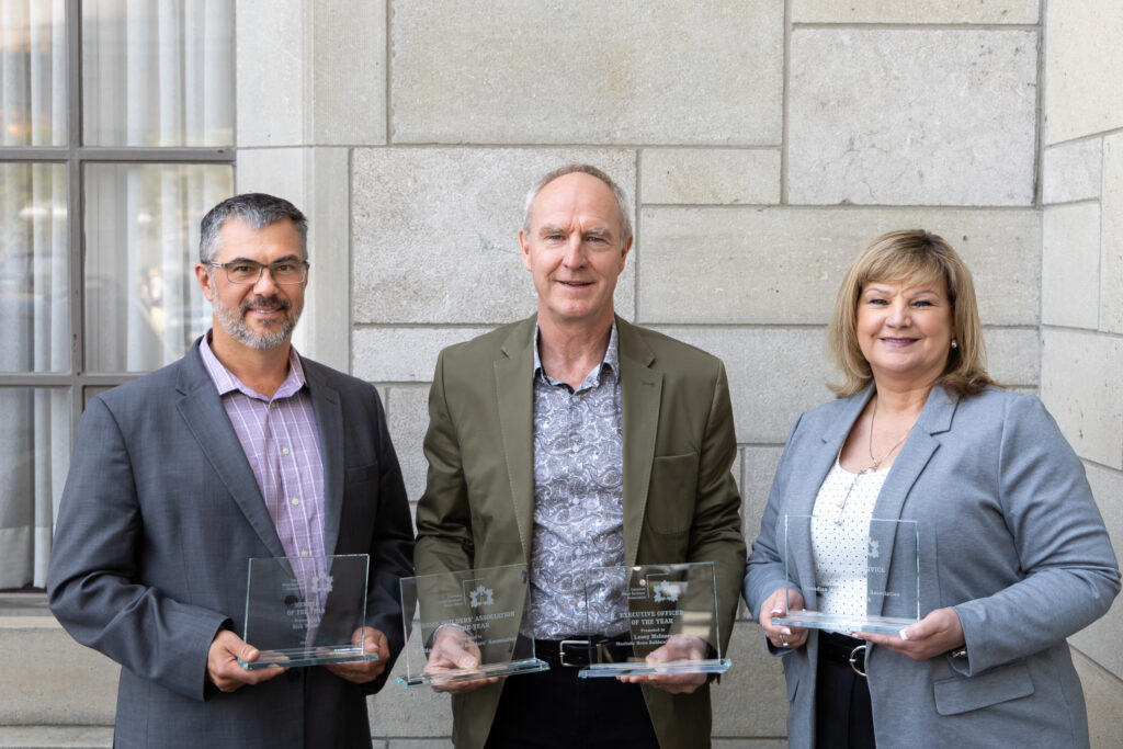 Left to Right: Rick Weste of BILD Lethbridge - Member of the Year, Ralph Oswald of MHBA accepts EO of the Year award on behalf of Larry McInnes and the HBA of the Year award,Sherry Claybourn of CHBA New Brunswick - Community Service Award