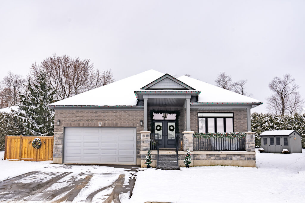 Net Zero Home in winter by WrightHaven Homes Ltd.