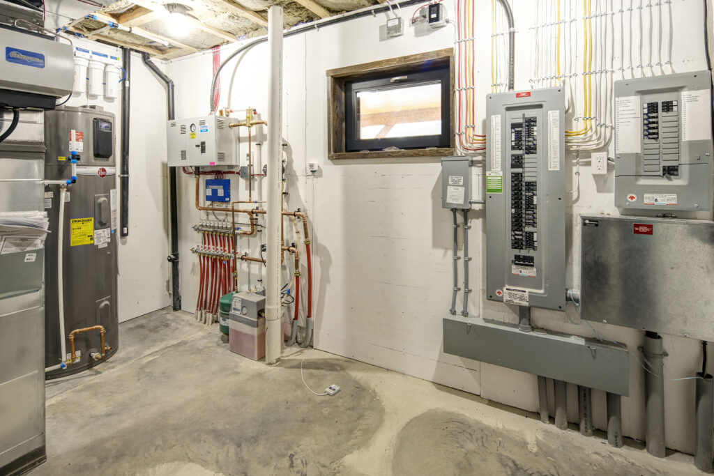 Mechanical room of Net Zero Home by STW Cutting Edge Carpentry