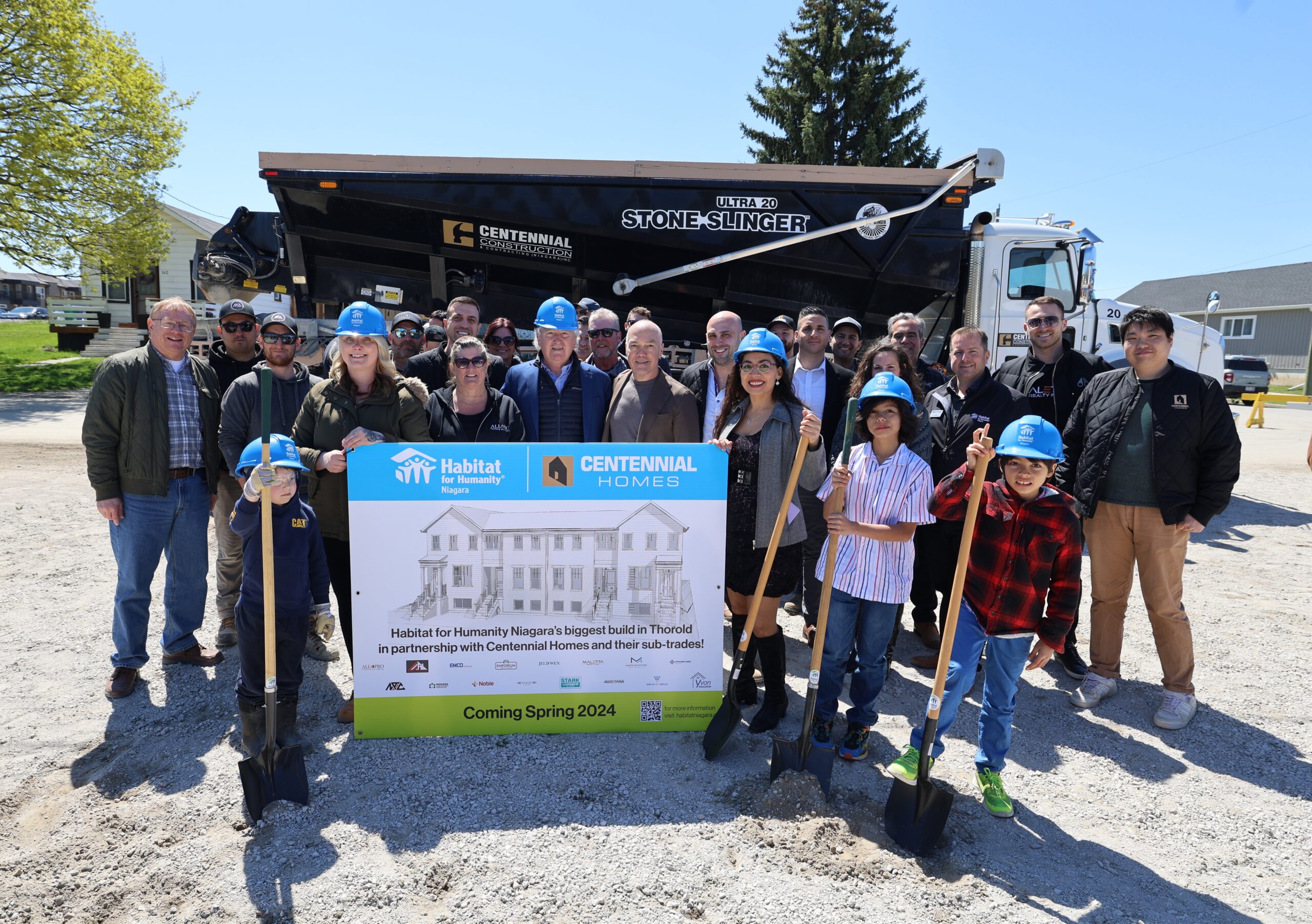 Centennial Homes builds 4 townhomes in support of Habitat for Humanity